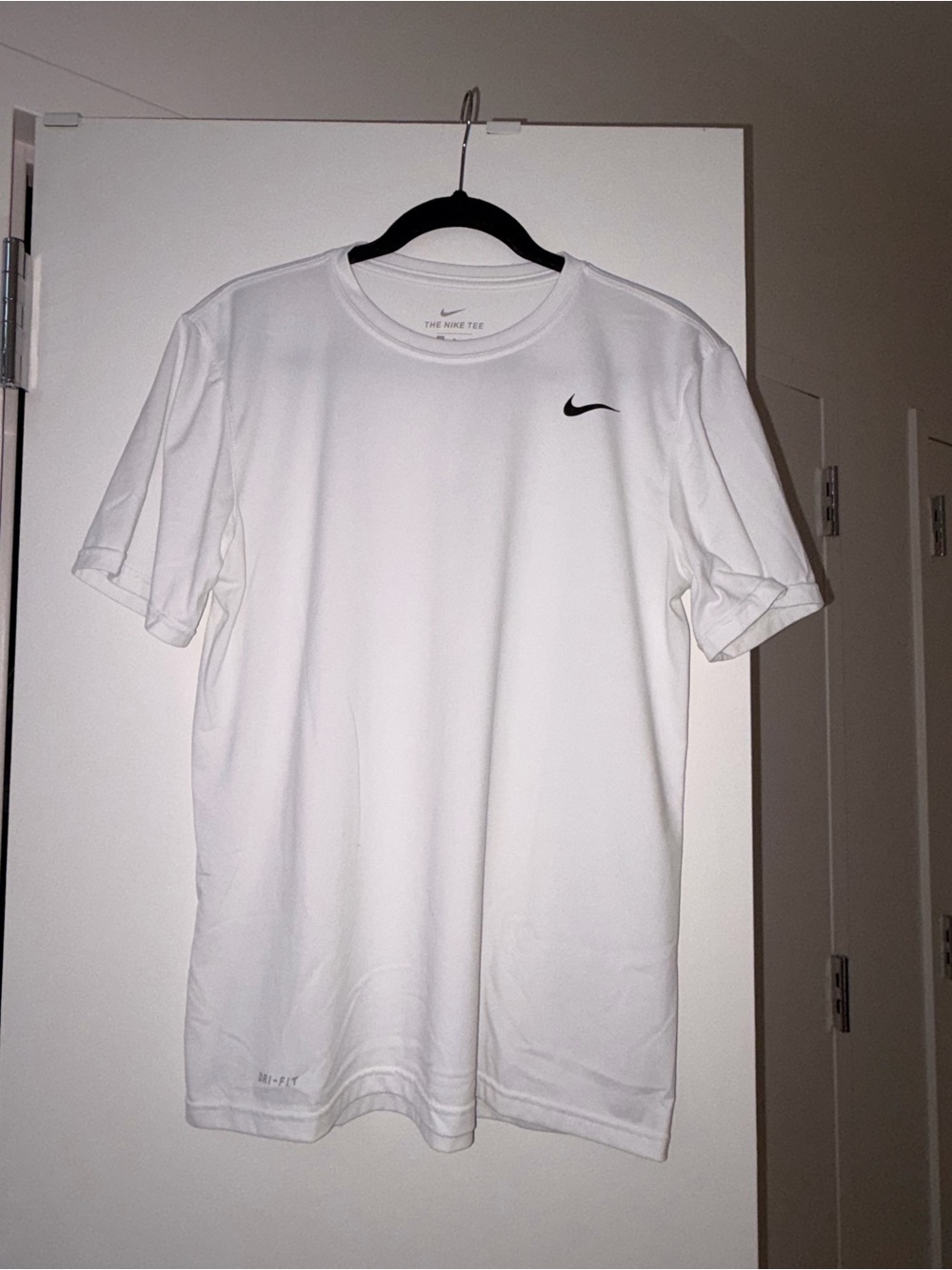 Nike White Short Sleeve Dri‑Fit Tee with Black Swoosh